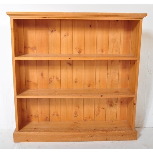 1260 - A Victorian style country pine revival open window bookcase. Raised on plinth base with open window ... 