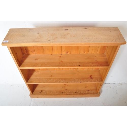 1260 - A Victorian style country pine revival open window bookcase. Raised on plinth base with open window ... 