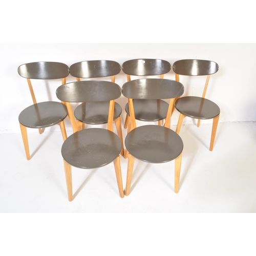 1262 - A set of six contemporary solid oak frame dining chairs. The light oak frames finished with round 'p... 