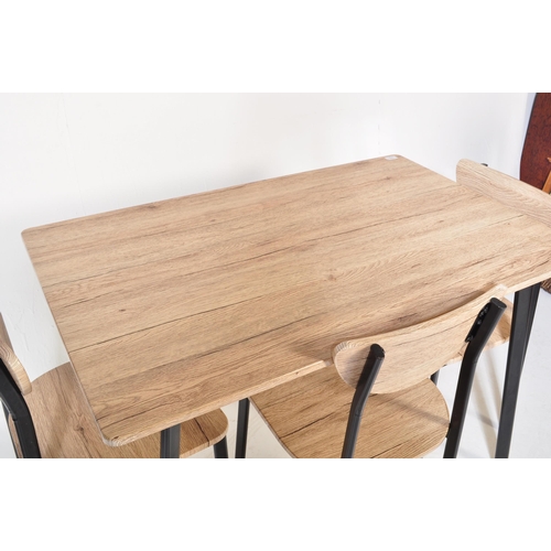 1263 - A vintage style drift wood white wash wood effect dining table with four chairs. The rectangular gra... 