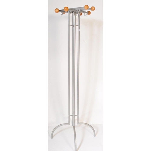 1265 - A vintage 20th Century tubular metal and wood freestanding coat stand. Having eight wood ball ends, ... 