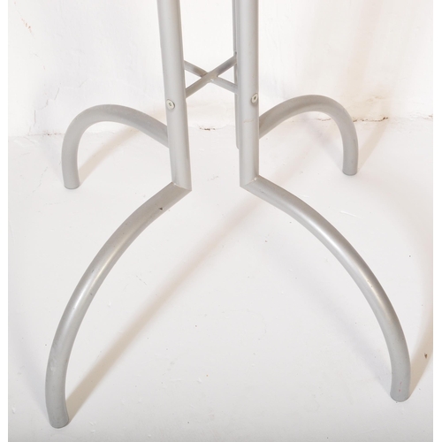 1265 - A vintage 20th Century tubular metal and wood freestanding coat stand. Having eight wood ball ends, ... 