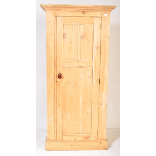 1269 - A retro Victorian 19th century pine hall cupboard. The hall wardrobe having a pediment top over a si... 