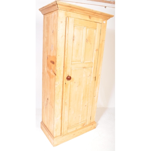 1269 - A retro Victorian 19th century pine hall cupboard. The hall wardrobe having a pediment top over a si... 