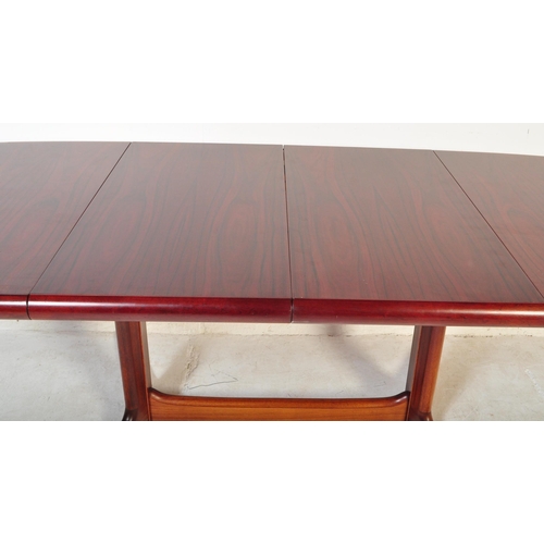 1270 - A retro vintage 20th century rosewood veneered Skovby Danish extending D-end dining table having cha... 