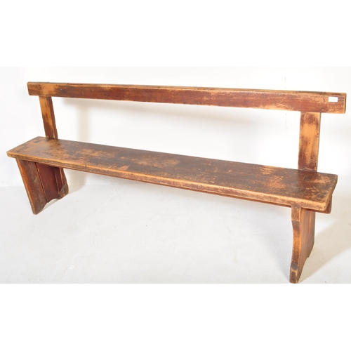 1273 - An early 20th century stained pained and waxed railway station type bench. The bench  having a strai... 