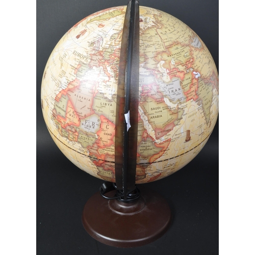 1275 - A contemporary antique style illuminating globe. A spherical form with brown circular base. Globes b... 