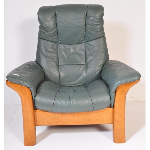 1276 - A retro vintage mid 20th Century original Stressless Ekornes reclining armchair. With green leather ... 