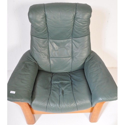 1276 - A retro vintage mid 20th Century original Stressless Ekornes reclining armchair. With green leather ... 