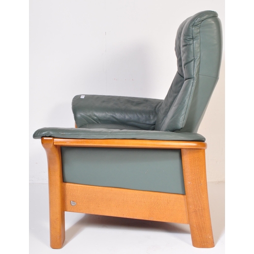 1276 - A retro vintage mid 20th Century original Stressless Ekornes reclining armchair. With green leather ... 