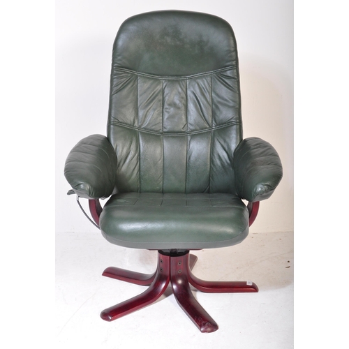 1278 - A retro vintage 20th Century swivel reclining desk office armchair. Having green leather back, armre... 