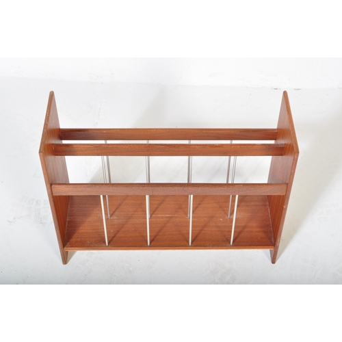 1285 - A retro vintage mid 20th Century teak wood magazine rack / holder. Having upright supports to either... 