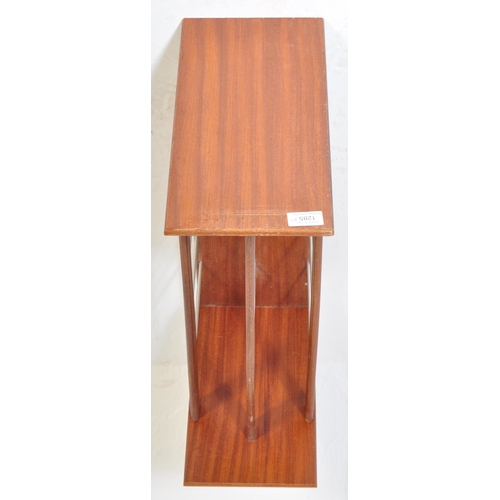 1285 - A retro vintage mid 20th Century teak wood magazine rack / holder. Having upright supports to either... 