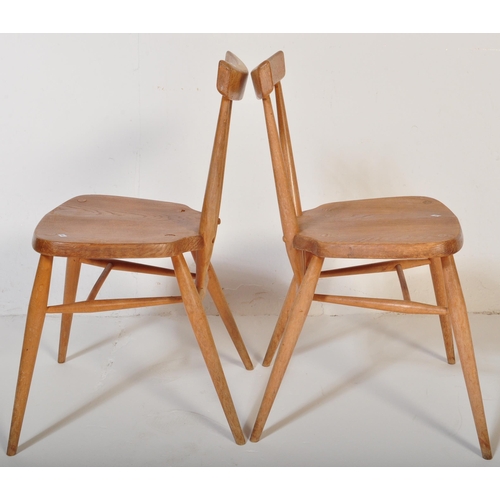 1290 - A pair of retro vintage mid 20th Century circa 1960s Ercol stacking chairs. Single slat back rest, w... 