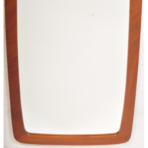 1293 - A vintage retro mid 20th century atomic style teak wall mirror having shaped wood back and mirror gl... 