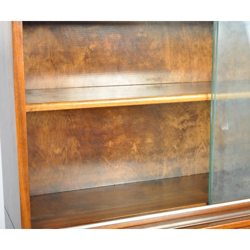 1308 - A 1960's mid century Minty lawyers bureau bookcase. The sliding glass bookcase top over fall front b... 