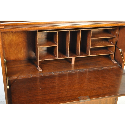 1308 - A 1960's mid century Minty lawyers bureau bookcase. The sliding glass bookcase top over fall front b... 