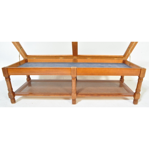 1323 - A retro vintage mid 20th Century glazed teak coffee table. Of rectangular form having two sectional ... 