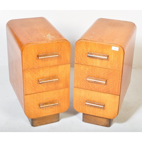 1330 - A pair of  1930's oak Art Deco bedside pedestal chests of drawers. Each chest with an inset plinth b... 