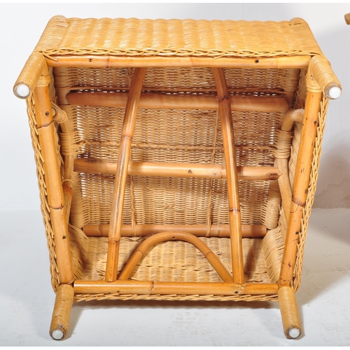 1331 - A pair of retro 20th century wicker / rattan weave armchairs. Shaped arms with fan backs, rattan wea... 