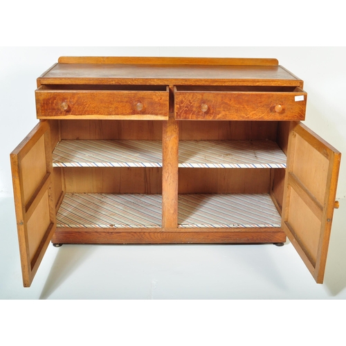 1367 - A retro vintage mid 20th century oak 1940's sideboard of CC Utility committee design. The sideboard ... 