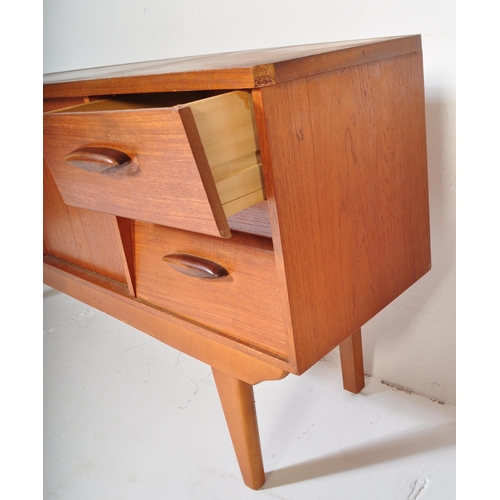 1368 - Beautility - A vintage retro mid 20th century teak Beautility sideboard. The sideboard having fall f... 