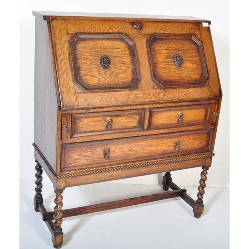 1454 - A 19th century Victorian Jacobean Revival oak bureau having fall front door to top with octagonal pa... 