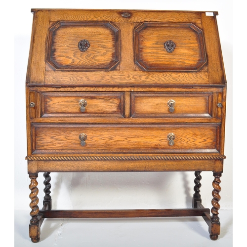 1454 - A 19th century Victorian Jacobean Revival oak bureau having fall front door to top with octagonal pa... 