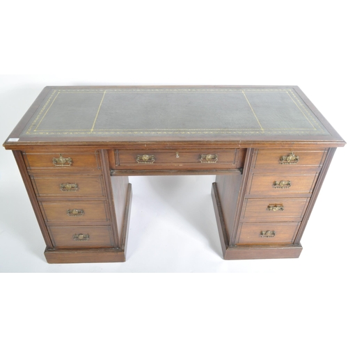 1456 - A 19th century Victorian mahogany twin pedestal writing desk. The desk having green leather skiver w... 