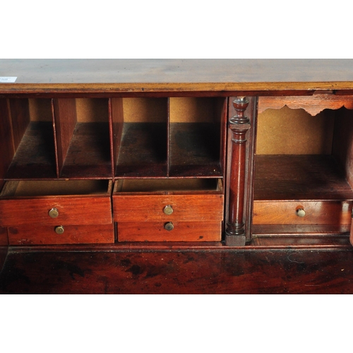 1458 - An 18th Century George III mahogany bureau desk with hinged lid opening to reveal a fitted interior ... 