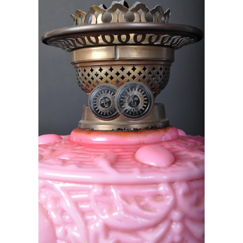 1460 - 19th Century brass and pink glass reservoir oil lamp with acid etched shade and flute. Having a colu... 