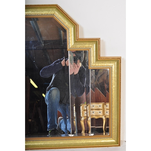 1463 - 20th Century Art Deco stepped gilt framed mirror with central bevelled edge mirror glass. Measures a... 