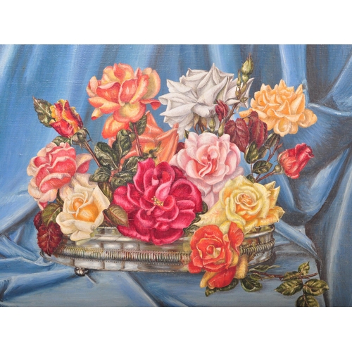 1465 - Daphne Brand - A mid 20th century still life oil on canvas painting to depict a series of roses upon... 