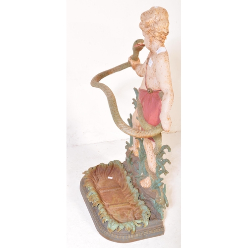 1473 - A Victorian 19th century cast iron umbrella - stick stand in the form Hercules grappling with a snak... 