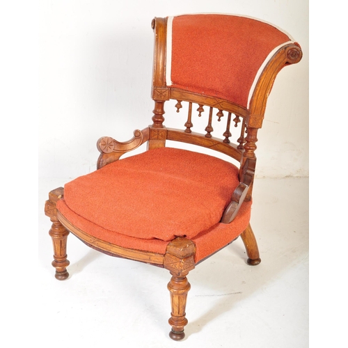 1478 - A Victorian 19th century oak & upholstered nursing chair having a splayed back lower finials detaili... 