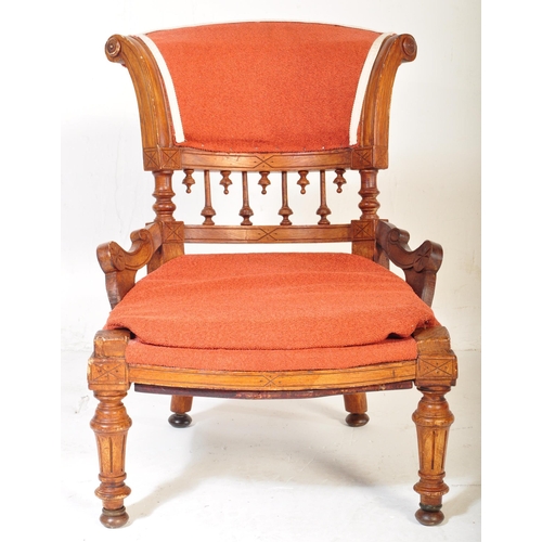 1478 - A Victorian 19th century oak & upholstered nursing chair having a splayed back lower finials detaili... 