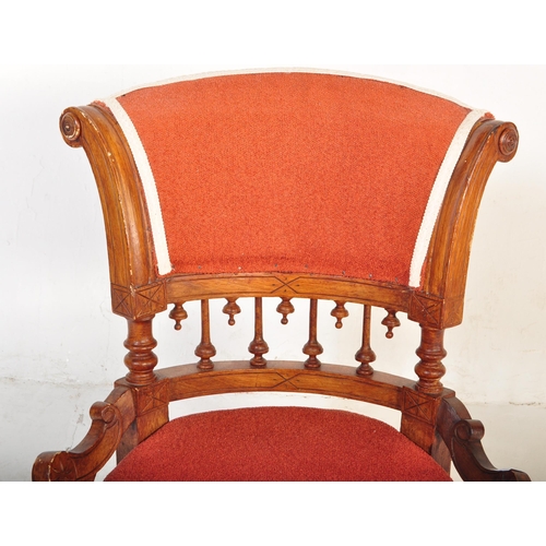 1478 - A Victorian 19th century oak & upholstered nursing chair having a splayed back lower finials detaili... 