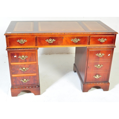 1480 - A George III revival 20th century mahogany and leather twin pedestal desk and filing cabinet. Raised... 