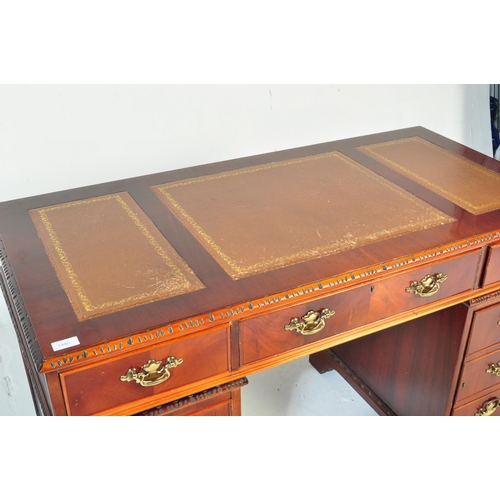 1480 - A George III revival 20th century mahogany and leather twin pedestal desk and filing cabinet. Raised... 