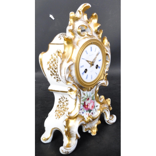 1483 - A 19th Century French porcelain ceramic mantel striking clock. With gilt decoration on a white groun... 