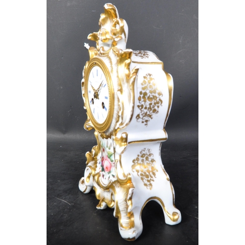 1483 - A 19th Century French porcelain ceramic mantel striking clock. With gilt decoration on a white groun... 