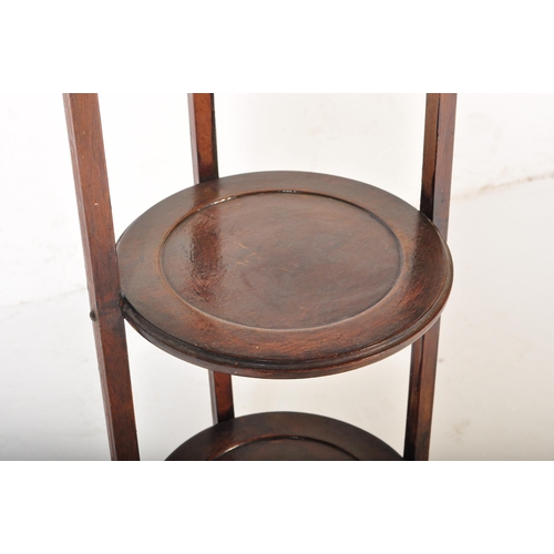 1485 - An early 20th Century circa 1920's mahogany folding cake stand. Having an carry handle to top, three... 