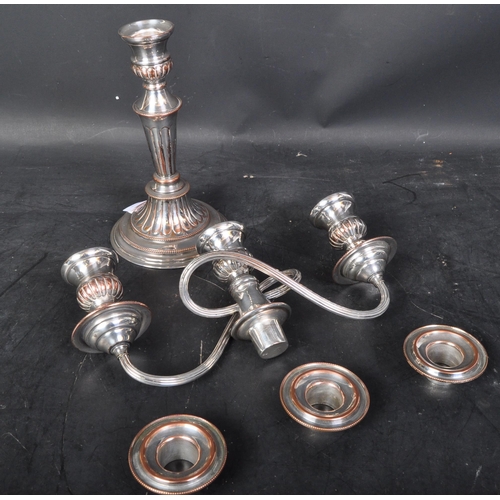 1486 - A vintage 20th Century silver on copper English hand chased candelabra. Having three holder on curve... 