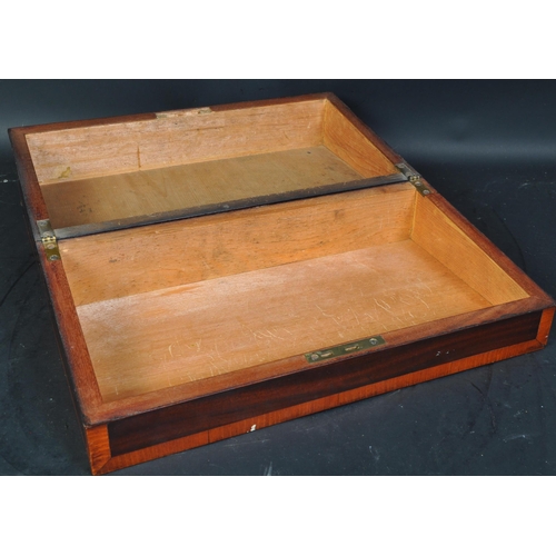 1487 - A Victorian 19th Century mahogany veneered writing slope box / chest. Of rectangular shape, with ven... 