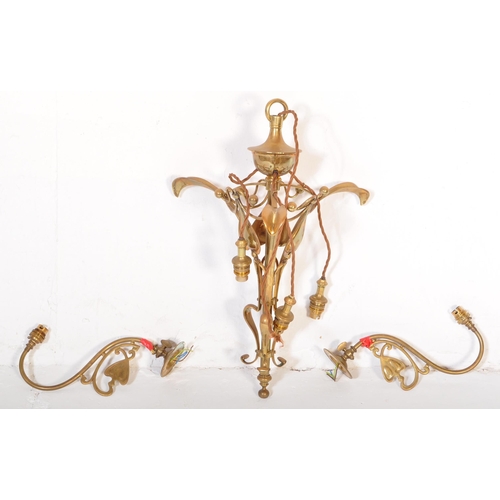 1488 - A 19th Century Art Nouveau brass hanging ceiling light. Having a tapering body with heart decoration... 