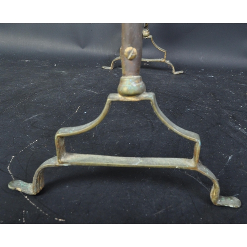 1489 - An early 20th century circa. 1910's Art Nouveau gilt metal fireguard having a scrolled handle atop o... 