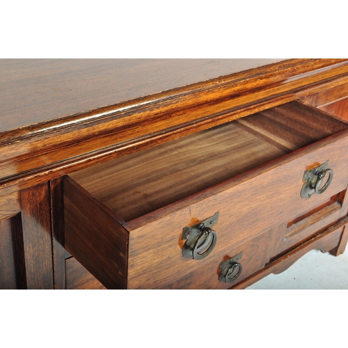 1496 - An Edwardian early 20th century walnut sideboard credenza having a flared chamfered top with gallery... 