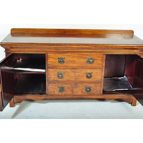 1496 - An Edwardian early 20th century walnut sideboard credenza having a flared chamfered top with gallery... 