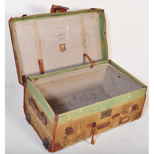 1498 - Early 20th century green, leather and wooden bound D-Mob steamer trunk chest. Of rectangular constru... 