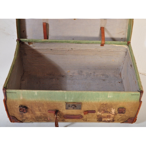 1498 - Early 20th century green, leather and wooden bound D-Mob steamer trunk chest. Of rectangular constru... 